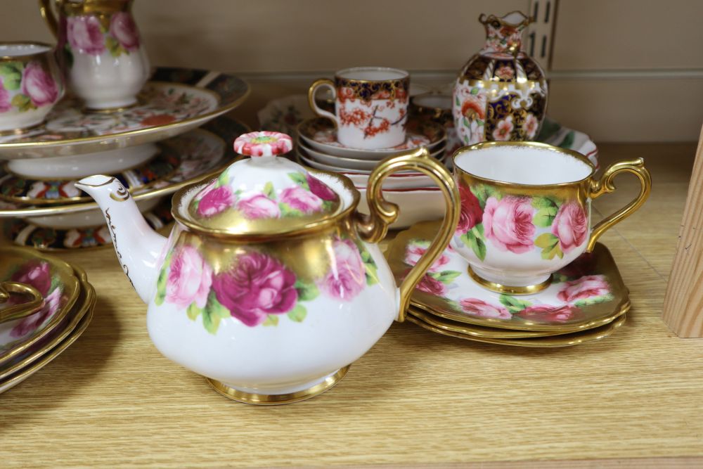 A Royal Albert Old Country Rose part tea set and a Crown Derby coffee set, two Derby comports etc.